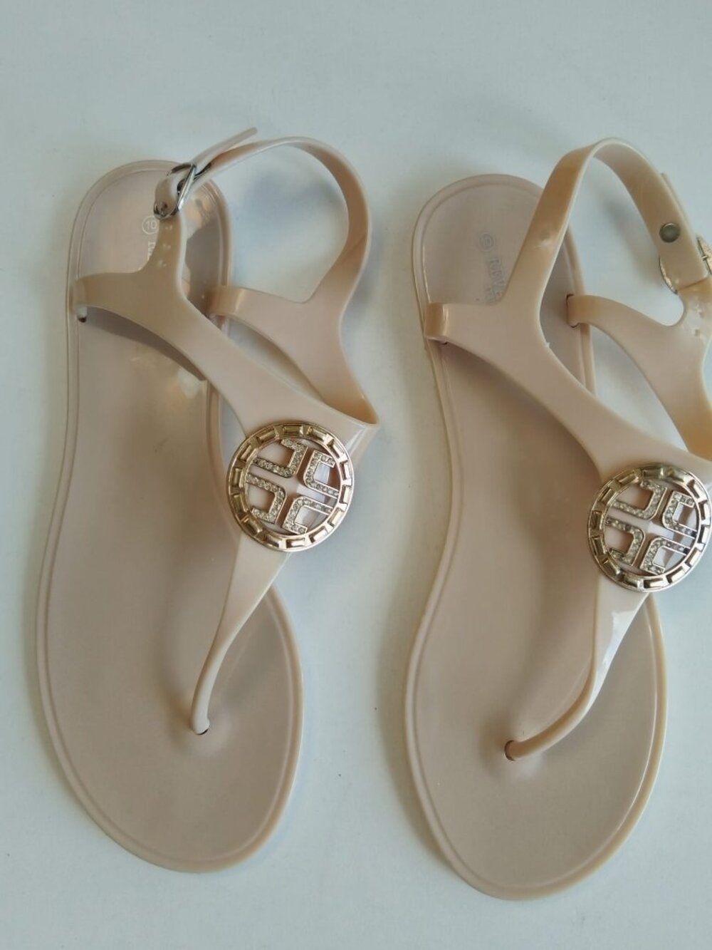 REVAMPED by Sirens Nude Jelly Sandals With Gold Rhinestone Logo - Size 10